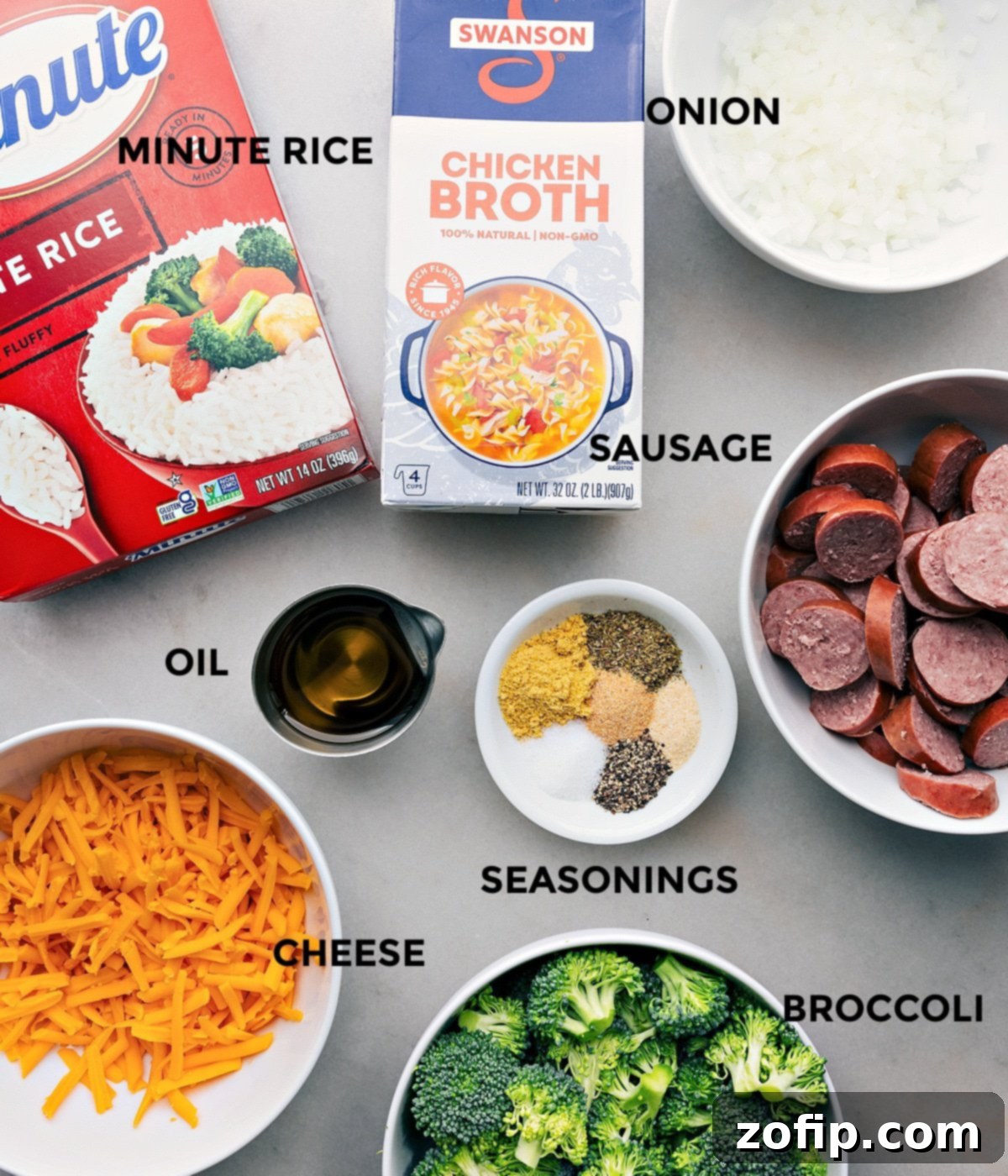 A vibrant display of all fresh ingredients prepped and ready for easy assembly of the Cheesy Broccoli & Chicken foil packs.