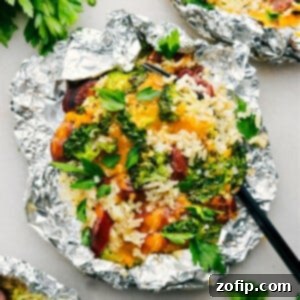 Foil Pack Cheesy Broccoli & Chicken fresh off the grill ready to be enjoyed.