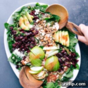 Quinoa and almond salad ready to be tossed together, all the fresh ingredients delicious and complimentary.