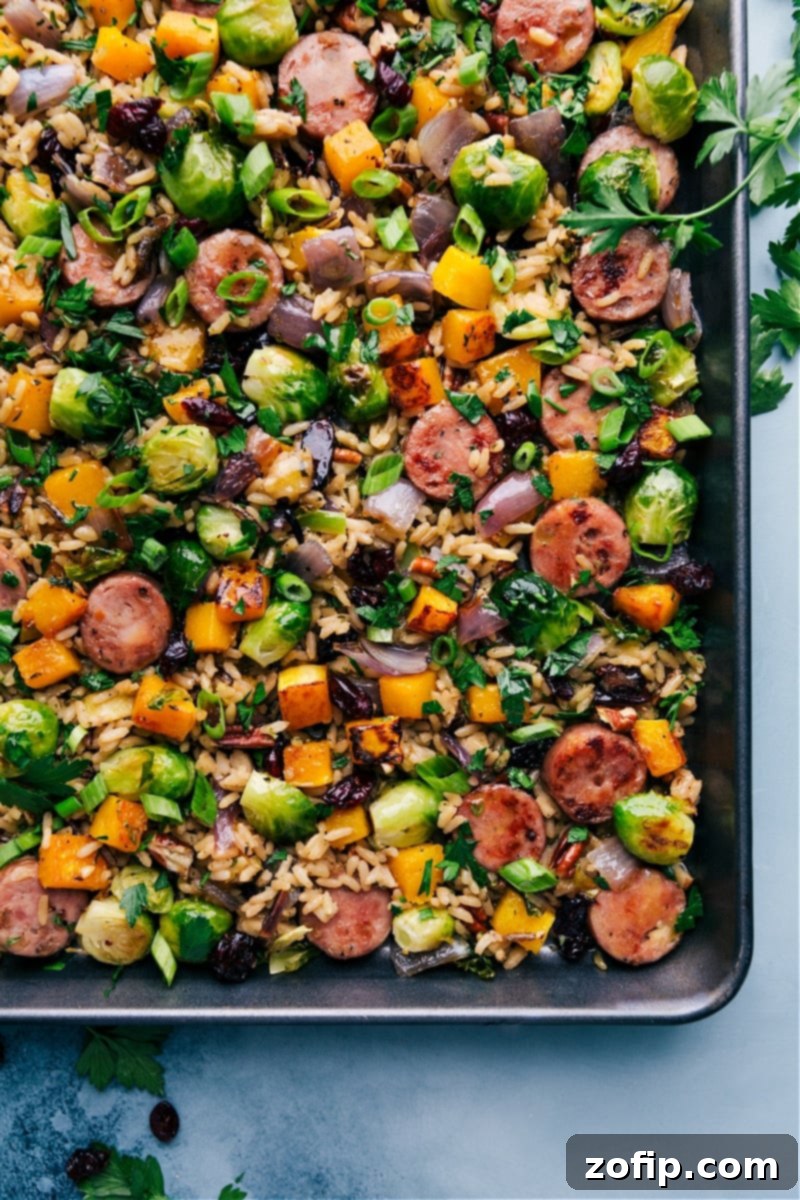 Overhead view of Butternut Squash Wild Rice Pilaf served in a rustic pan, showcasing the colorful ingredients.