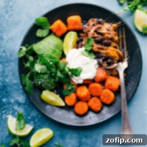 Deconstructed Beef Totchos with crispy sweet potato tots, savory beef, and fresh toppings