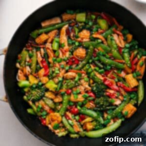 Delicious Rotisserie Chicken Stir-Fry with garnishes
