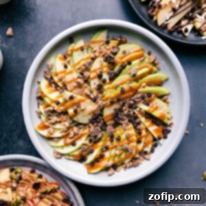 A colorful plate of Apple Nachos with various toppings.