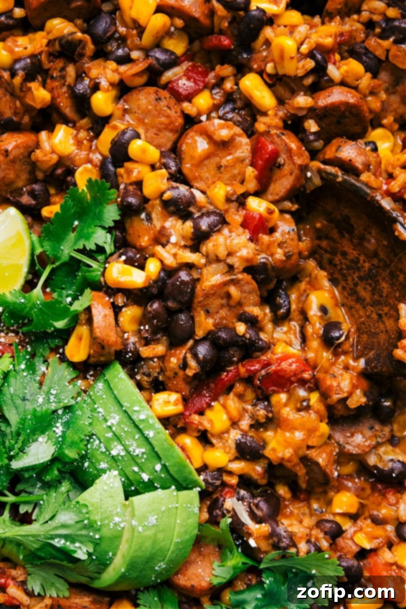 Sausage and Rice (one skillet meal) with smoked chicken sausage, crisp sweet corn, savory black beans, roasted peppers, and tender rice