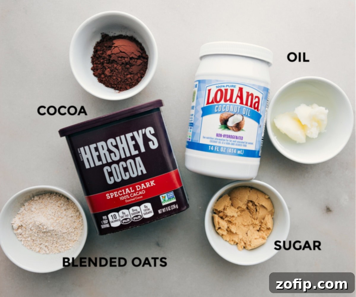 All the specific ingredients needed for the homemade 'Oreo' crumble laid out for easy preparation, ready to be incorporated into the energy bites.