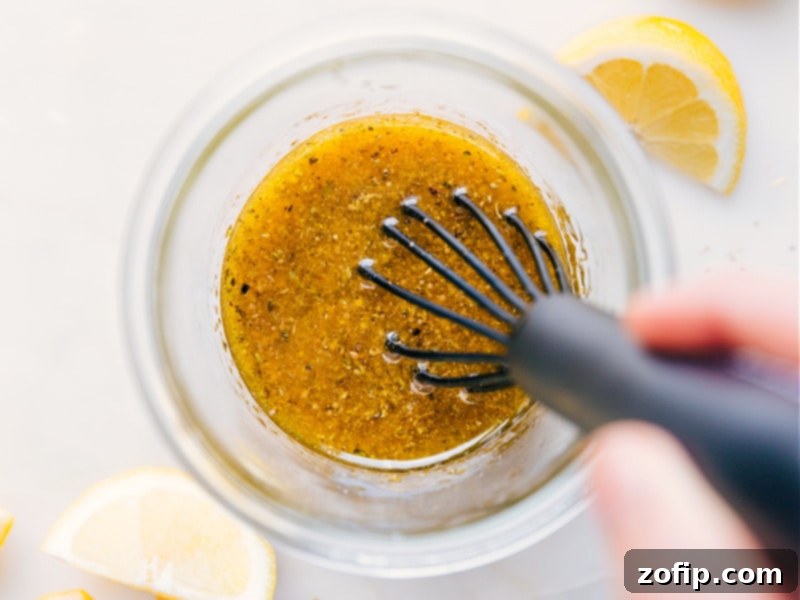 Image of the finished Greek Salad Dressing, perfectly mixed and ready to be drizzled over a fresh salad.