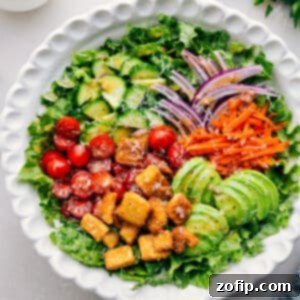A vibrant garden salad in a bowl, ready to be served.