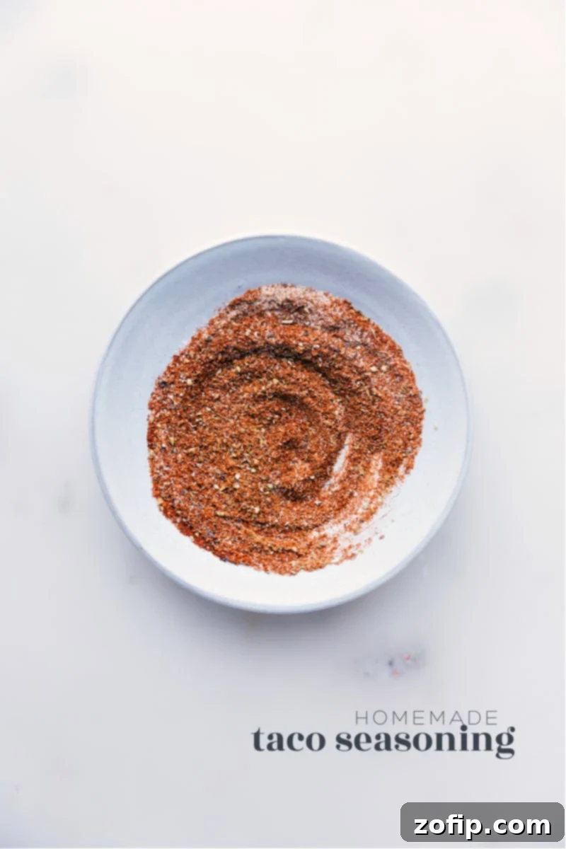 Taco Seasoning in a bowl, showcasing vibrant spices ready to be mixed.
