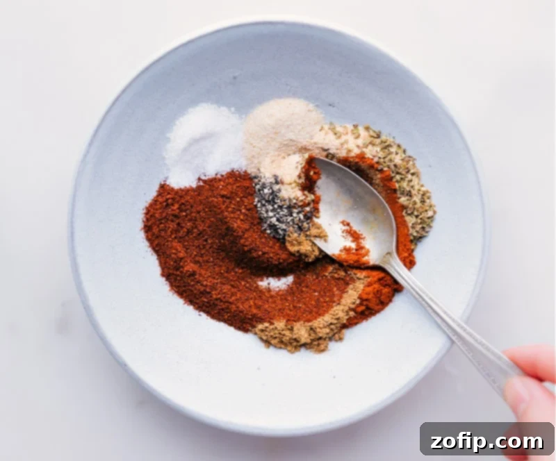 Process shots showing the taco seasoning blend being mixed together in a bowl.