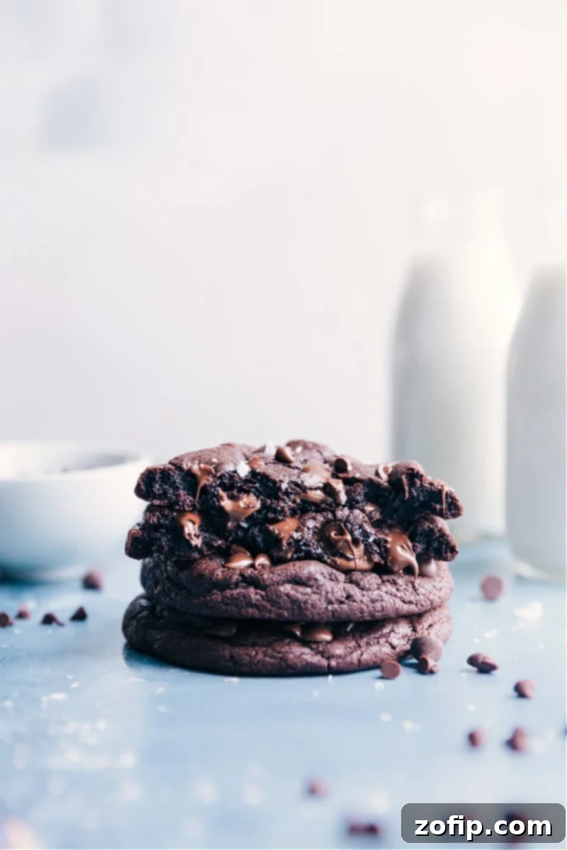 Stacked Bakery Style Chocolate Cookies showcasing their thick, chewy texture and rich chocolate