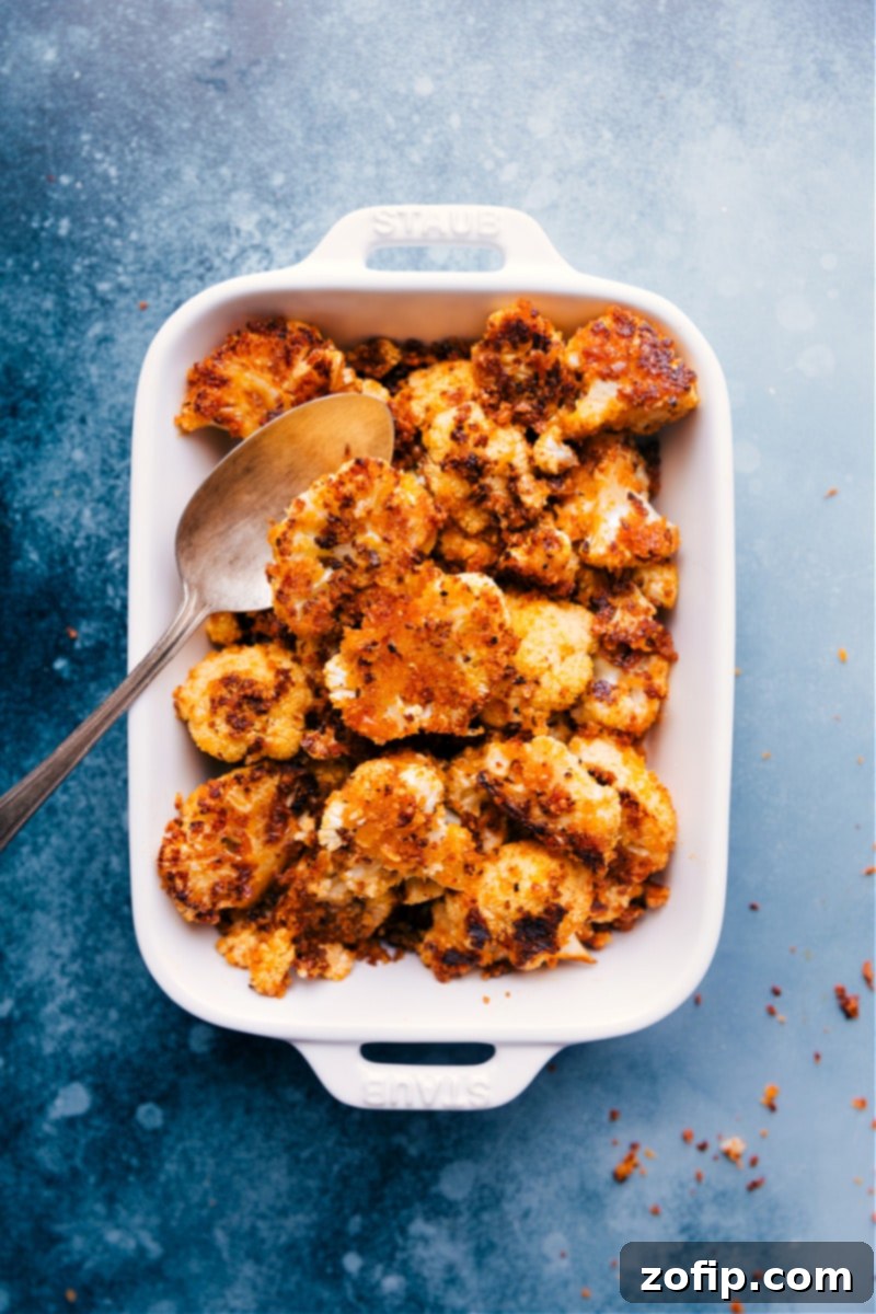 Crispy Roasted Cauliflower florets on a baking sheet