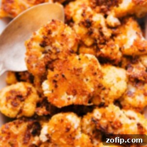 Close-up of golden Parmesan-crusted roasted cauliflower