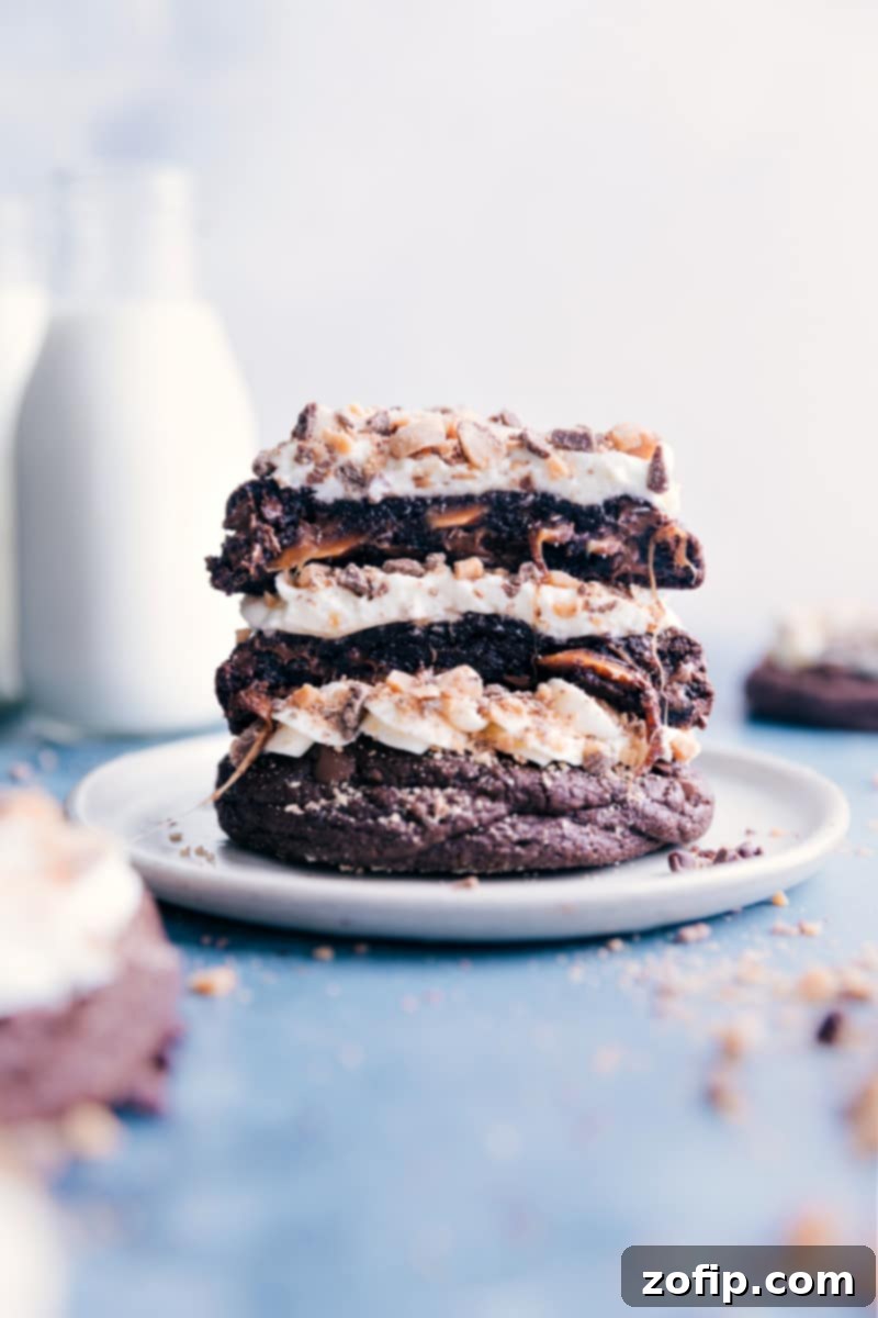 Decadent Heath Bar Cookies: The Ultimate Chocolate Caramel Toffee Dessert Stacked Heath Bar Cookies showcasing rich chocolate, gooey caramel, fluffy frosting, and toffee bits