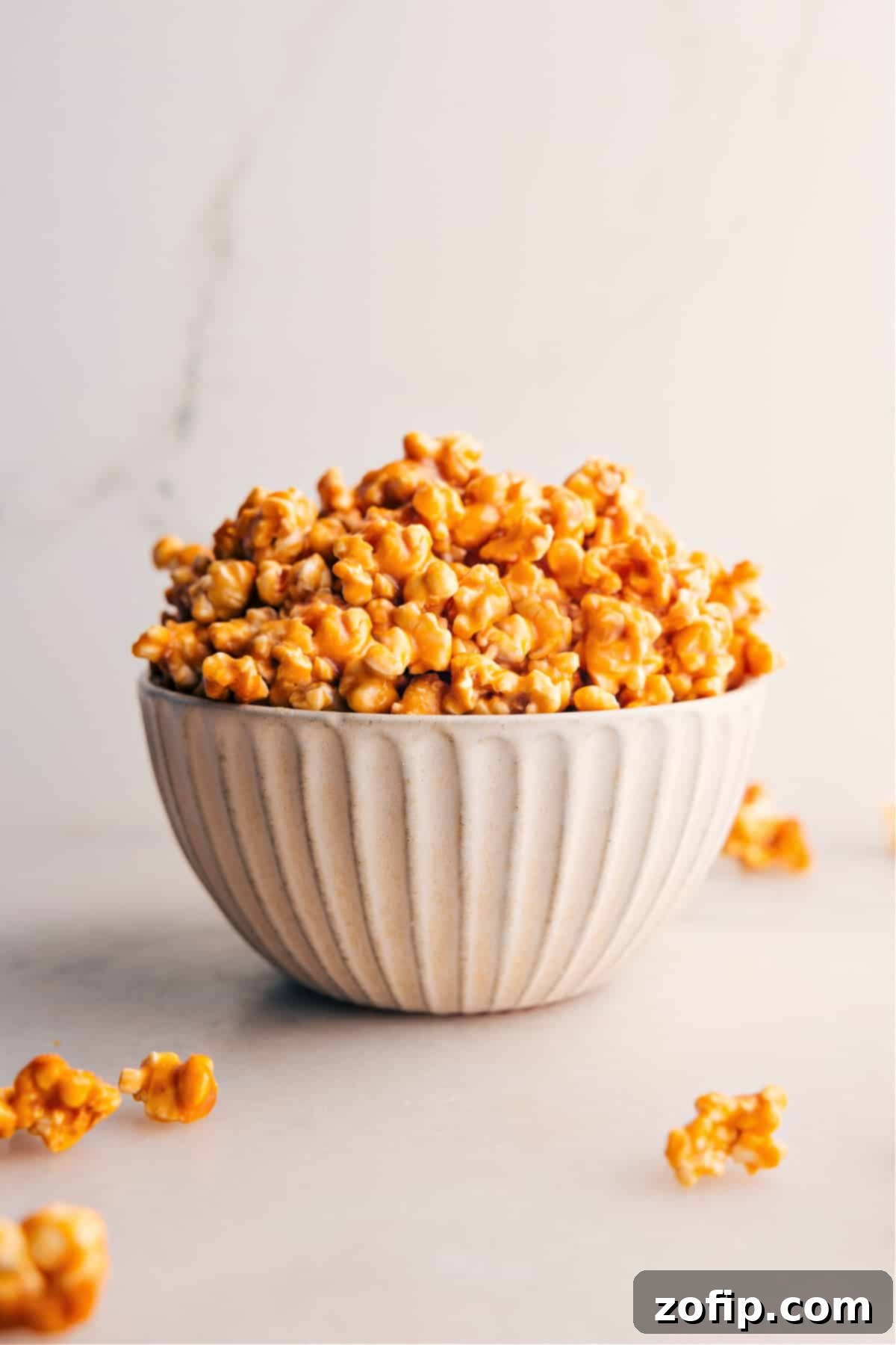 Caramel Corn Recipe in a bowl, ready to serve and enjoy.