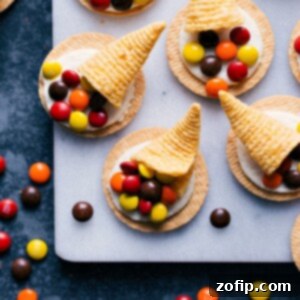 Sweet Thanksgiving Delights 3 Close-up of a festive Thanksgiving cornucopia cookie with colorful M&M's.