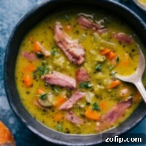 A bowl of thick and creamy split pea soup with ham