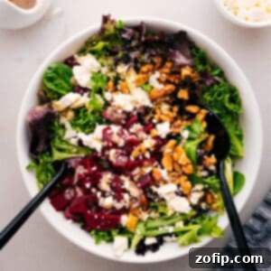 The finished Beet Goat Cheese Walnut Salad, topped with dressing.