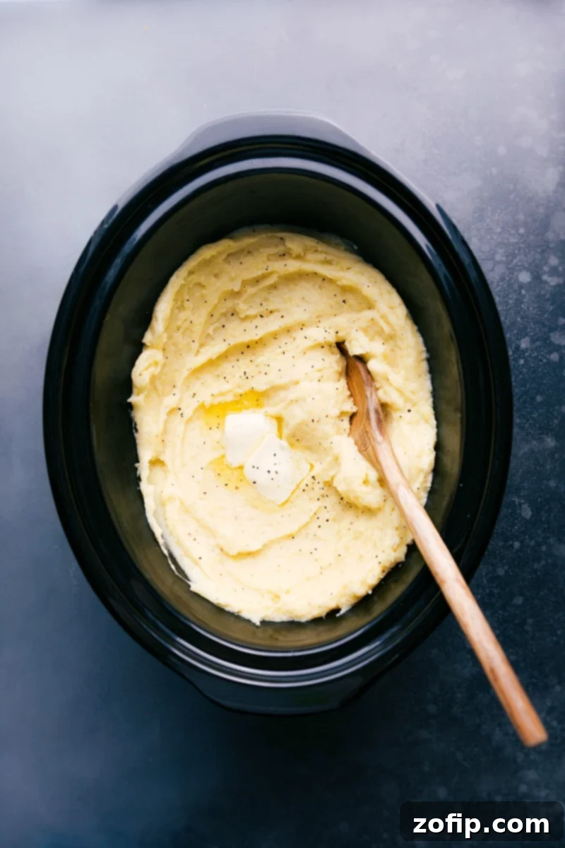 Ready-to-Enjoy Creamy Crockpot Mashed Potatoes Creamy crockpot mashed potatoes, perfectly seasoned and ready to be enjoyed.