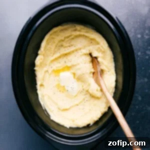 Creamy Slow Cooker Mashed Potatoes 2 Creamy crockpot mashed potatoes, perfectly seasoned and ready to be enjoyed.