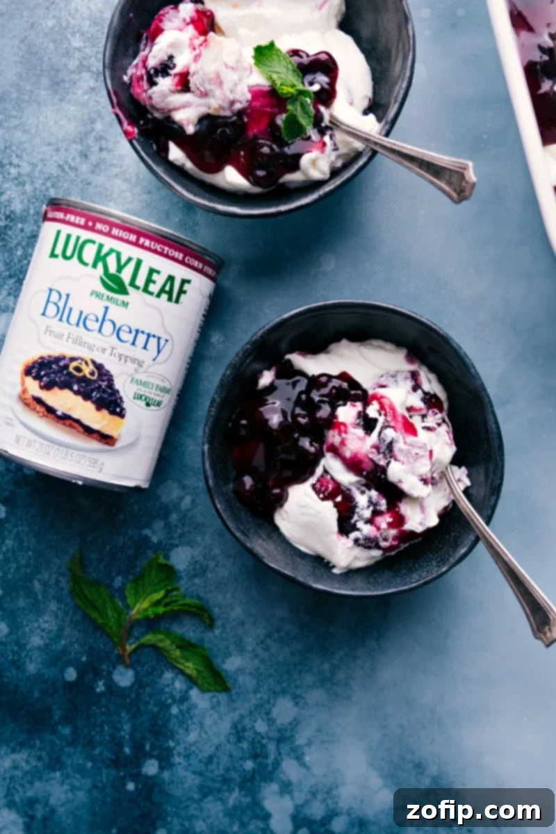 Overhead image of Blueberries and Cream Cake Trifle served in individual bowls, ready to enjoy.