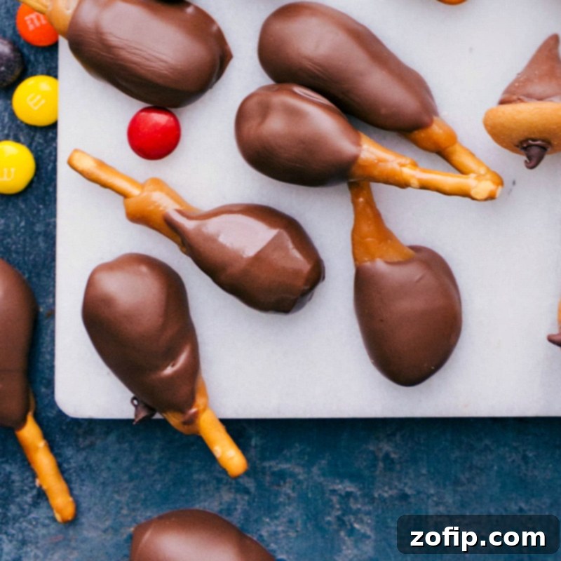 Fun and Tasty Candy Turkey Legs for Thanksgiving Fun and tasty candy turkey legs made with pretzels, caramel, and chocolate, a festive and simple Thanksgiving treat idea.