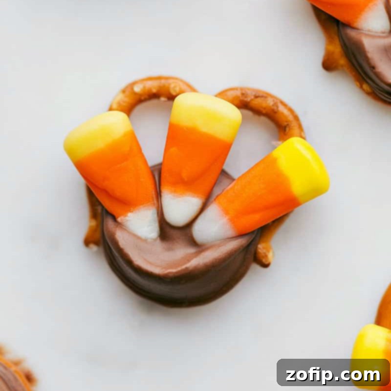 Delicious and Colorful Turkey Pretzel Treat A colorful and tasty turkey pretzel treat, a delightful and easy-to-make Thanksgiving snack for holiday gatherings.