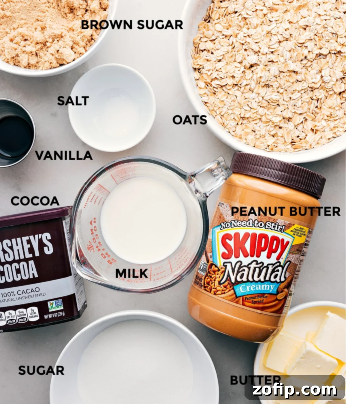 Ingredients In No Bake Cookies Carefully measured ingredients for no bake cookies, including oats, salt, creamy peanut butter, vanilla extract, cocoa powder, and brown sugar, all prepped for easy assembly.