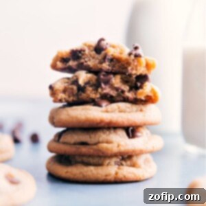 Close-up of a stack of Peanut Butter Chocolate Chip Cookies, highlighting their soft texture and abundant chocolate chips.