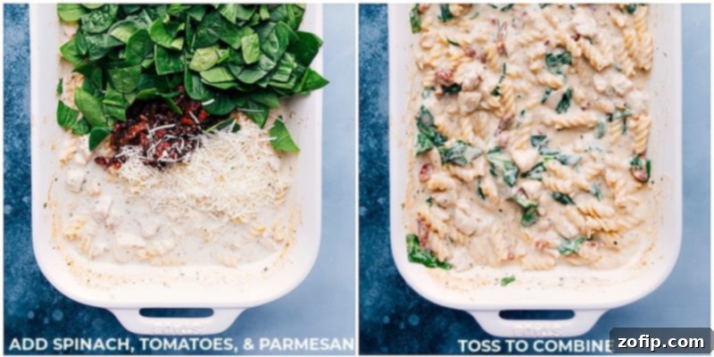 Close-up shot of creamy Tuscan Chicken Pasta, garnished with fresh herbs, ready to be served.