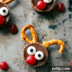 Two mini reindeer treats arranged on a festive plate