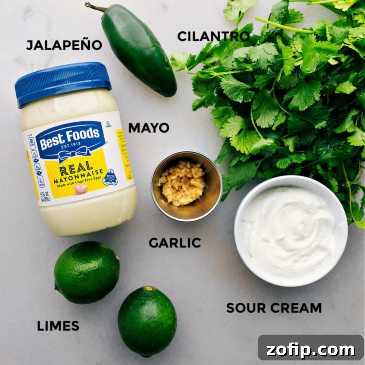 All the fresh ingredients for Cilantro Lime Sauce, neatly prepped and ready for easy blending.