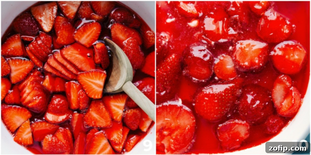 The Essential Strawberry Jell-O Layer Fresh sliced strawberries being gently stirred into the strawberry Jell-O mixture, which is then carefully poured over the creamy layer of the Strawberry Pretzel Salad.