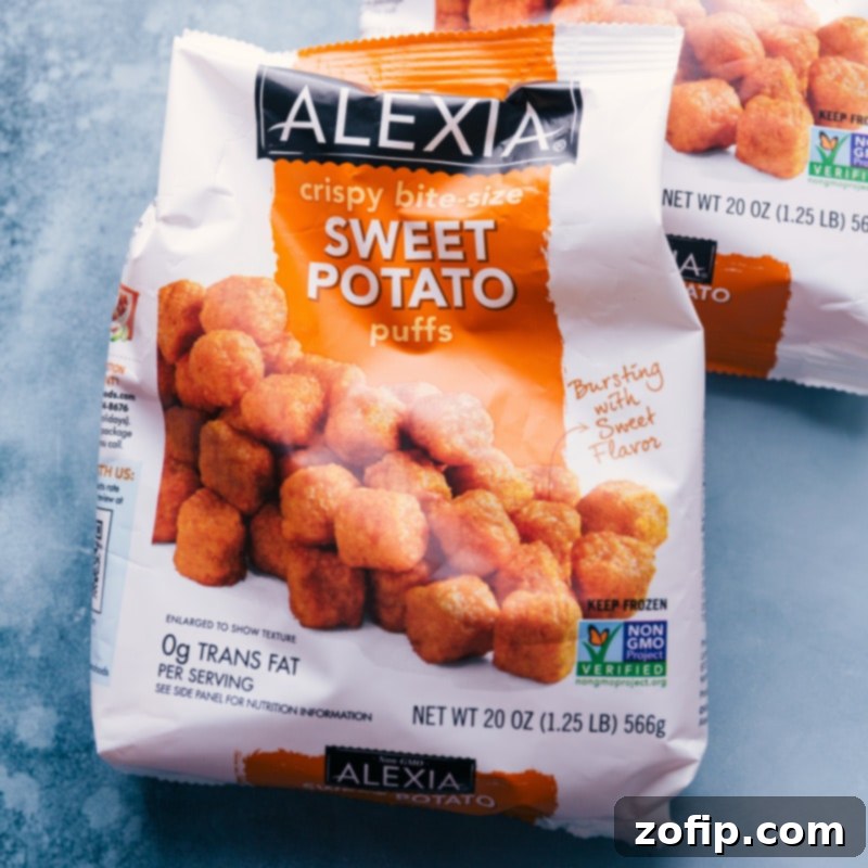 Close-up image of Alexia Crispy Bite-Size Sweet Potato Puffs, highlighting their golden texture, the preferred choice for this Totchos recipe.