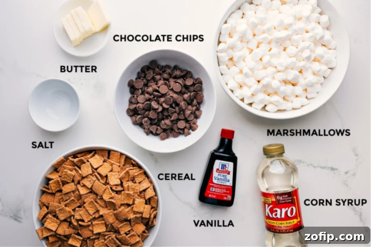 All the ingredients for S'mores Cereal Bars, including butter, chocolate chips, marshmallows, corn syrup, vanilla extract, graham cereal, and a pinch of salt, neatly laid out and prepped for easy assembly.