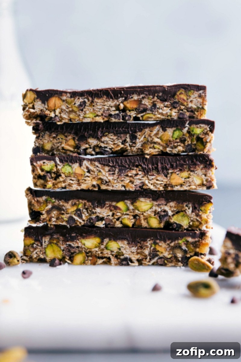 A perfectly formed granola bar, showcasing its wholesome ingredients and delicious texture, stacked and ready to be enjoyed.
