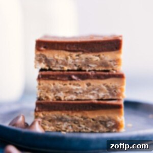 Close-up of a stack of Lunch Lady Peanut Butter Bars, showcasing the texture and layers.