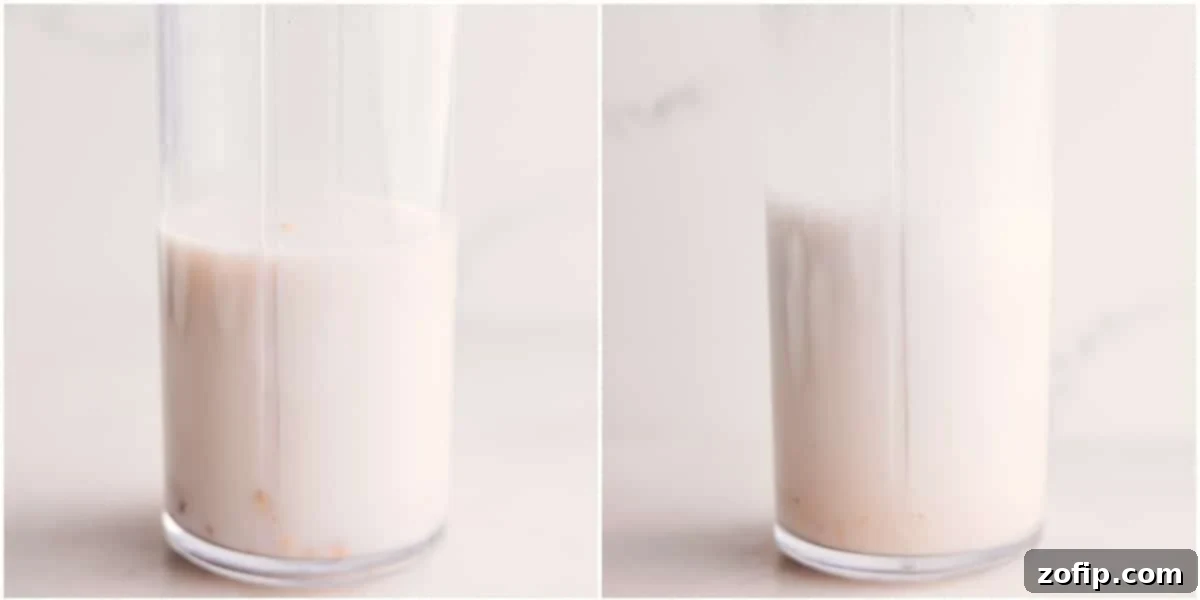 How to Start Your Golden Milk Smoothie Adding cashews and milk to a high-speed blender, the first step in making a smooth Golden Milk Smoothie base.