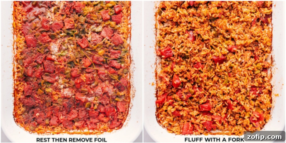 Freshly baked One-Pan Mexican Rice being fluffed with a fork in the baking dish, steam gently rising.
