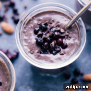 A delicious Chocolate Blueberry Smoothie in a glass, ready to be enjoyed.