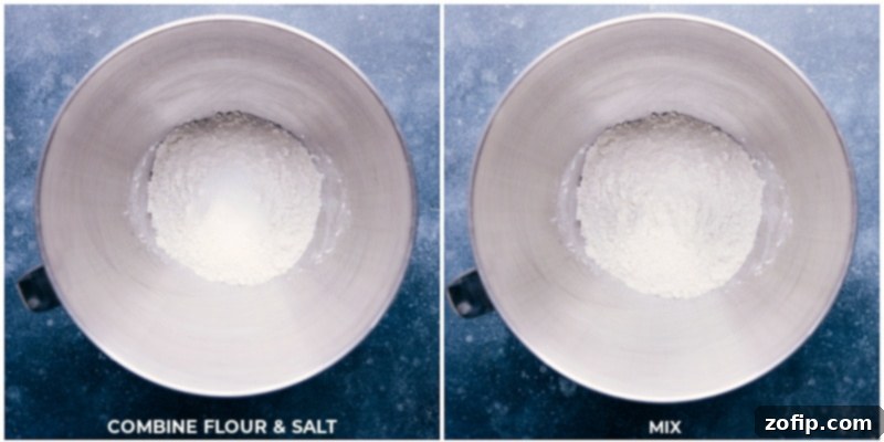 Image of flour and salt being precisely measured and added to a stand mixer bowl, ready for mixing.