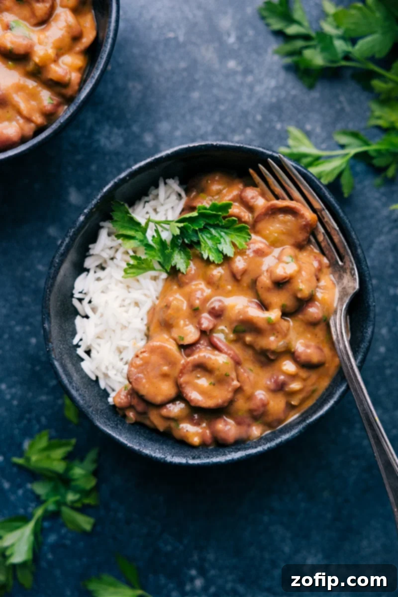 Classic Red Beans and Rice with Andouille Sausage A deliciously creamy bowl of Red Beans and Rice with sliced Andouille sausage.