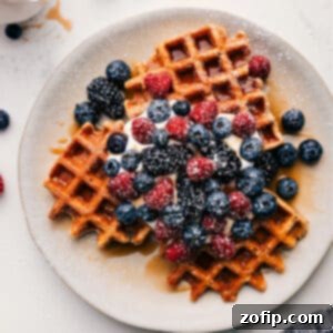 Close-up of a stack of healthy waffles, perfectly golden and fluffy, ready to be topped.