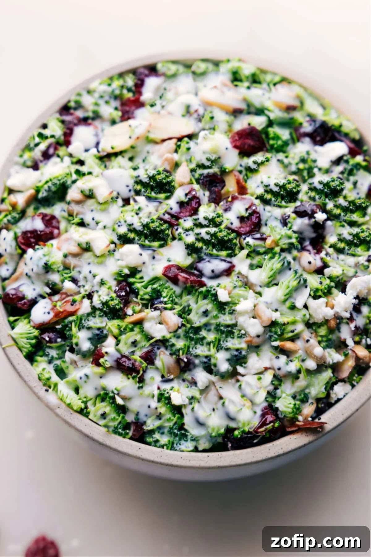 Lemon Poppy Seed Broccoli Salad in a bowl, garnished and ready to serve.