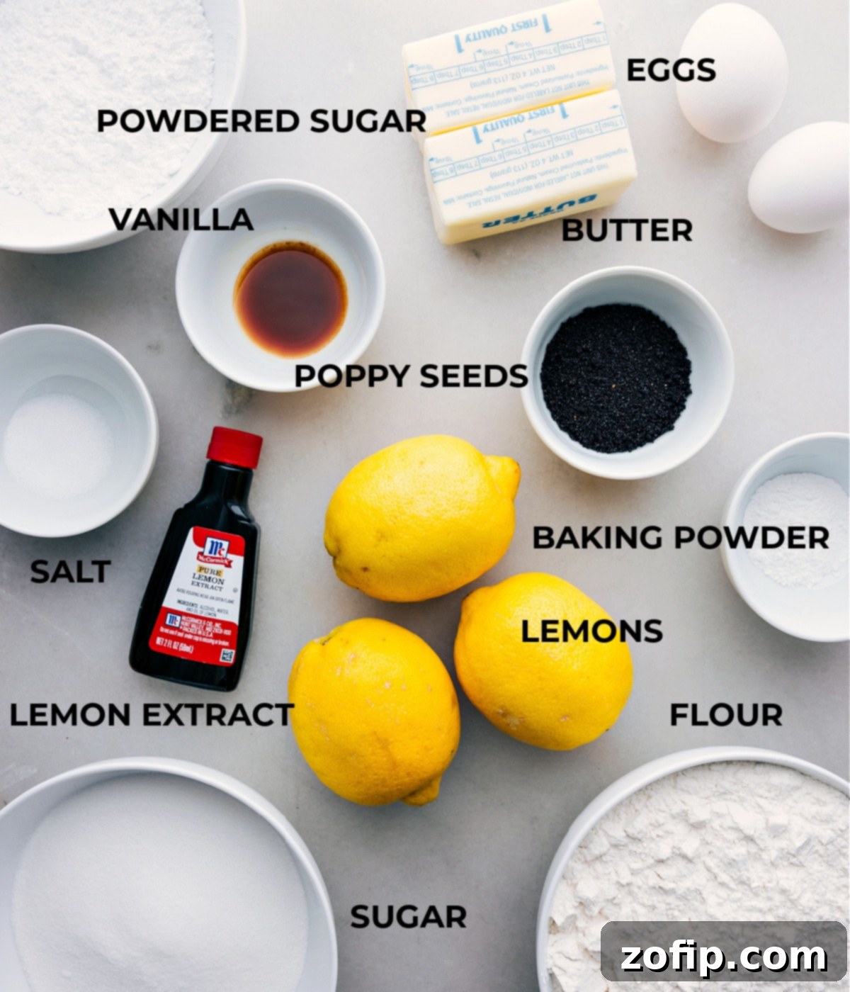 Key Ingredients for Zesty Lemon Poppy Seed Cookies Prepped Essential ingredients for Lemon Poppy Seed Cookies, including fresh lemons, butter, sugar, eggs, vanilla and lemon extract, baking powder, salt, and poppy seeds, neatly prepped for baking.