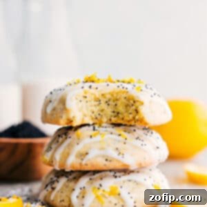 Zesty Poppy Seed Delights 3 Delicious Lemon Poppy Seed Cookies, freshly baked and glazed.