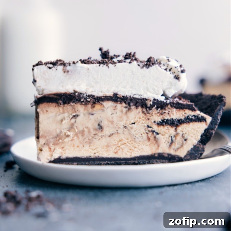 Perfectly Sliced Mississippi Mud Pie: A Vision of Chocolate Bliss An enticing up-close image of a beautifully sliced Mississippi Mud Pie on a plate, highlighting its rich chocolate layers and creamy texture, ready to be enjoyed.