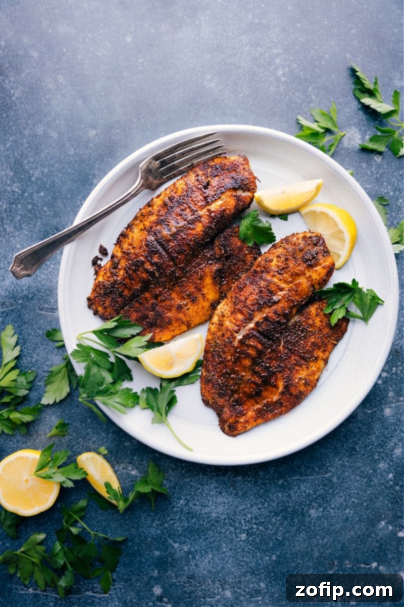 Perfectly cooked Air Fryer Tilapia fillets, overhead shot, ready to serve.