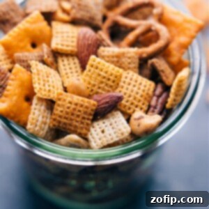 A close-up of a bowl of freshly made Chex Mix, highlighting its texture and inviting appearance.