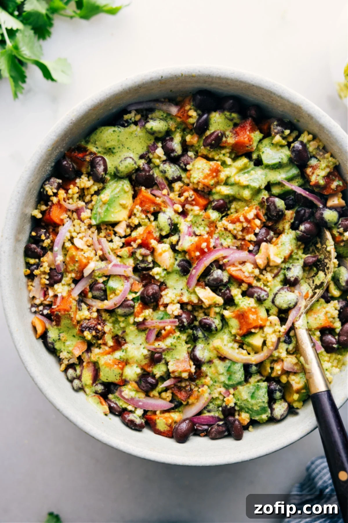 Sweet Potato Black Bean Salad in a bowl, dressed and ready to enjoy.