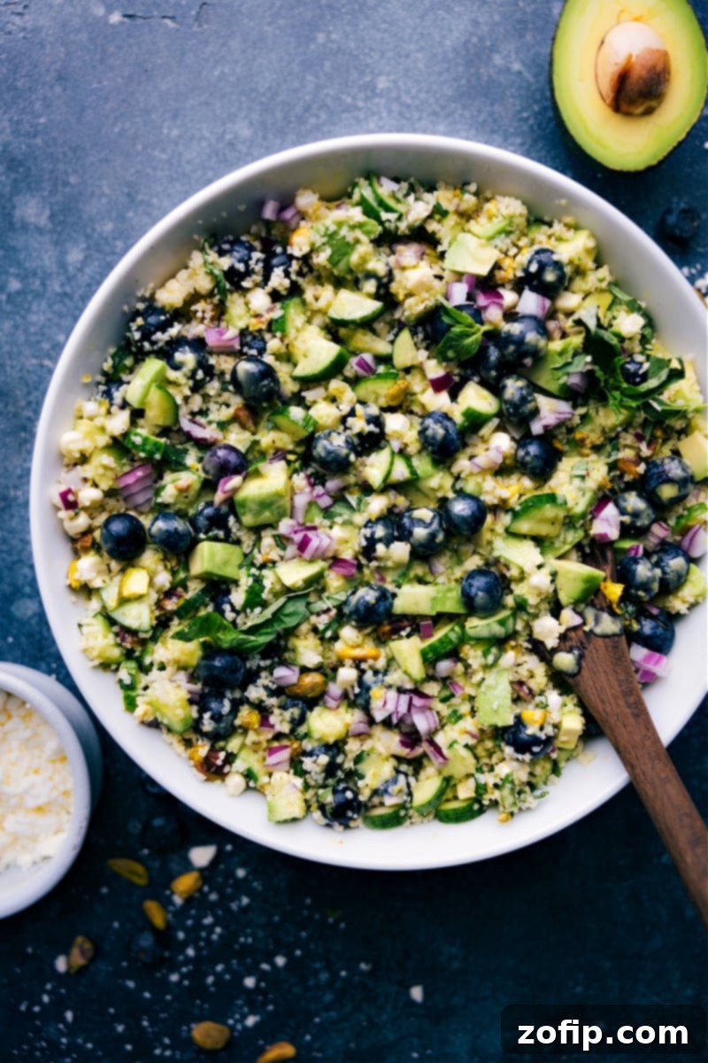 Delicious Blueberry Corn Salad: A fresh, easy, and healthy meal or side dish perfect for any occasion. Vibrant overhead view of Blueberry Corn Salad with crisp corn, sweet blueberries, creamy avocado, crunchy pistachios, and tangy feta